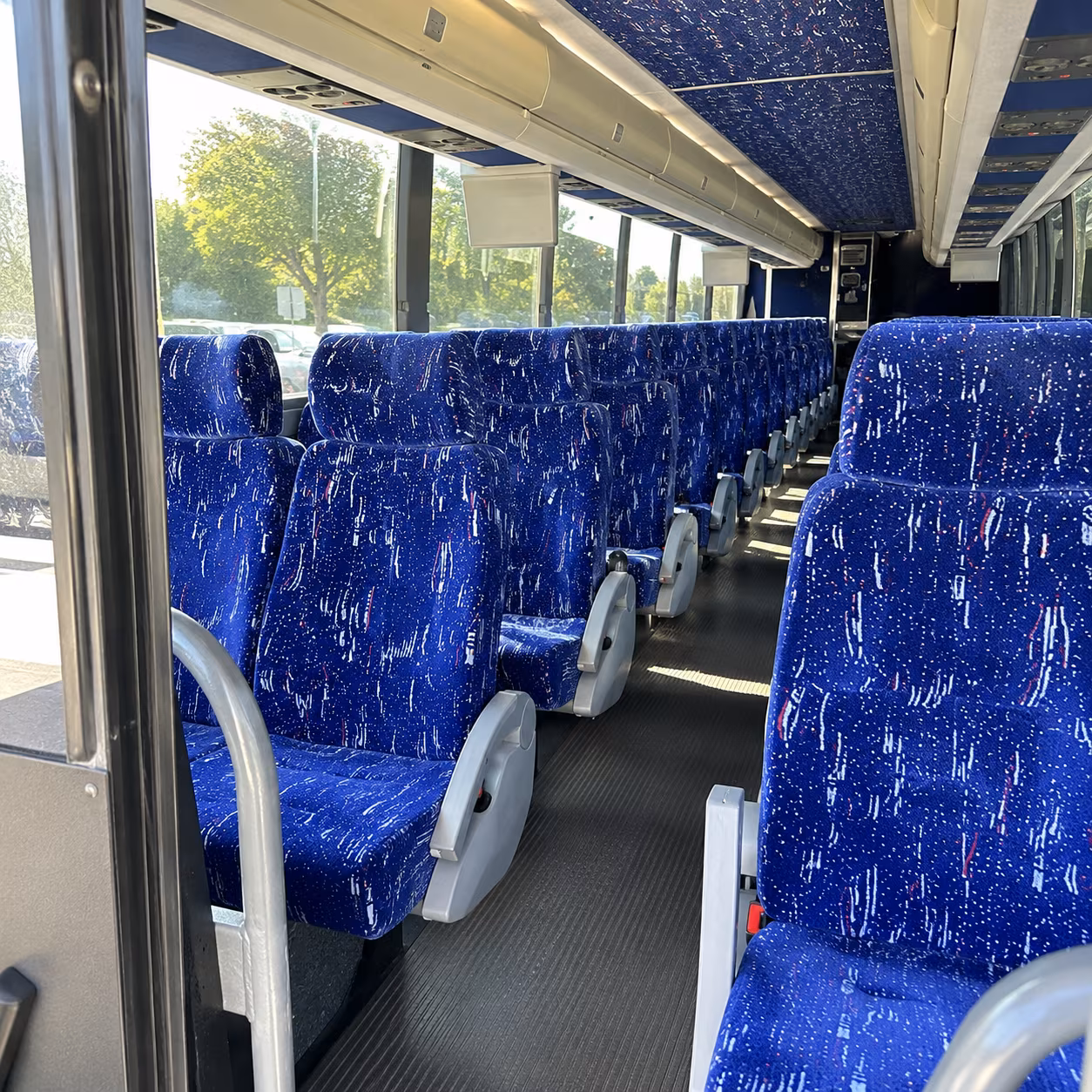 new bedford 50 passenger charter bus inside